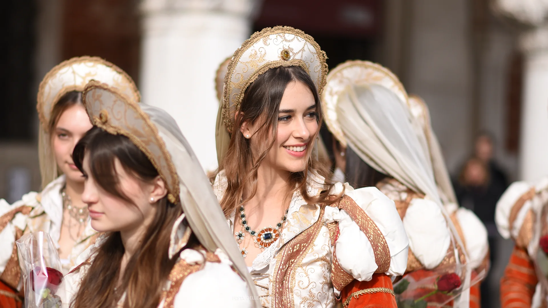 Young women in Renaissance-inspired costumes during Festa delle Marie at the Venice Carnival