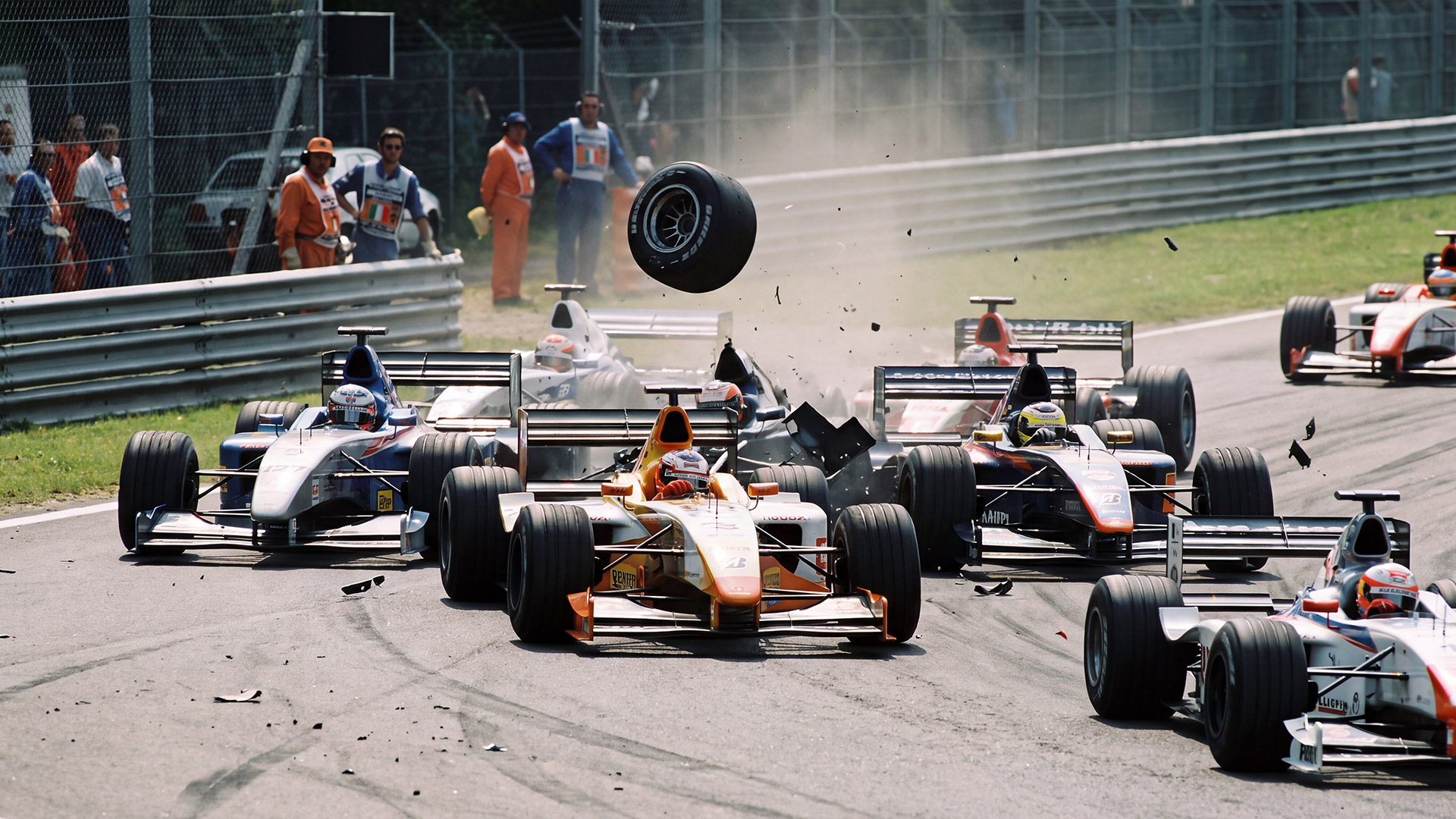 The Dark Side of Monza Circuit - Fatal Accidents and the Dangerous Years of Formula 1 5 Formula racing cars involved in a high-speed accident with a detached wheel at Monza Circuit