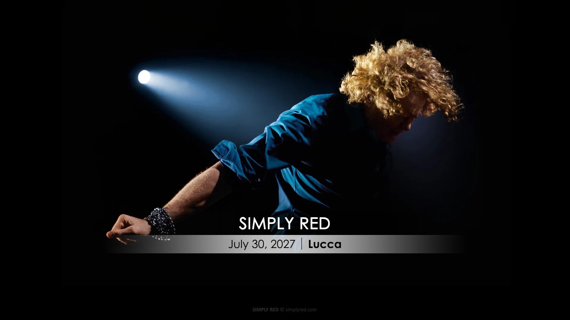 Simply Red - Mick Hucknall performing on stage. Concert at Lucca Summer Festival, July 30, 2027.